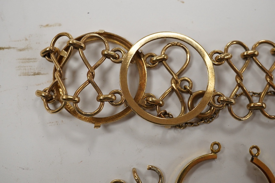 A 9ct gold coin bracelet (now lacking coins), one other 9ct gold coin mount and a similar yellow metal mount, gross weight 13.4 grams. Condition - poor to fair